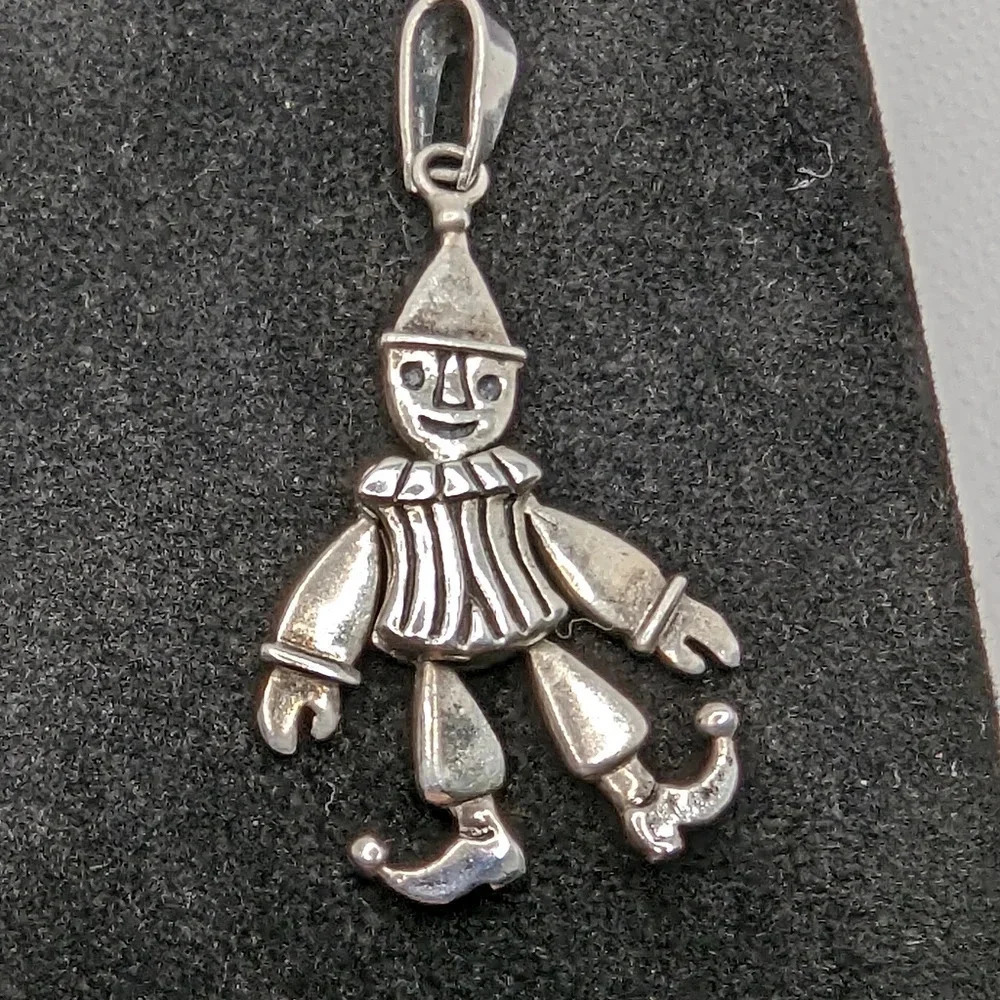 Vintage articulating jester pendant